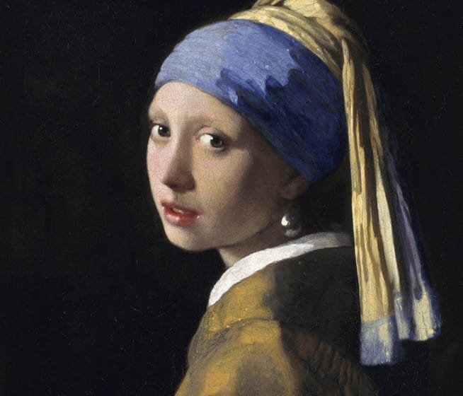 The painting is a tronie, the Dutch 17th-century description of a 'head' that was not meant to be a portrait. It depicts a European girl wearing an exotic dress, an oriental turban, and what was thought to be a very large pearl as an earring. In 2014, Dutch astrophysicist Vincent Icke raised doubts about the material of the earring and argued that it looks more like polished tin than pearl on the grounds of the specular reflection, the pear shape and the large size of the earring.